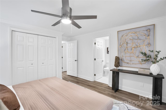 9826 Meringue Pl Unit 15, Charlotte, NC 28270 - bedroom featuring wood finished floors, a closet, ornamental molding, baseboards, and ceiling fan