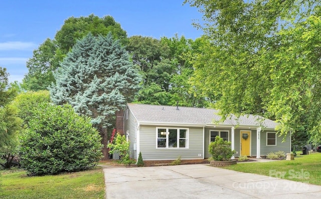 9826 Meringue Pl, Charlotte, NC 28270 - ranch-style house featuring a shingled roof, a front lawn, and concrete driveway
