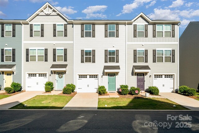 2037 Langer St, Charlotte, NC 28214 - townhome / multi-family property featuring concrete driveway