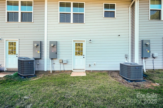 2037 Langer St, Charlotte, NC 28214 - rear view of house with central AC and a yard