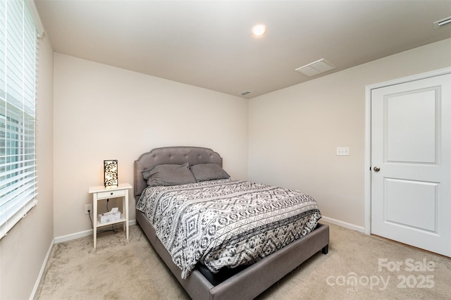 2037 Langer St, Charlotte, NC 28214 - bedroom with light carpet, baseboards, and multiple windows