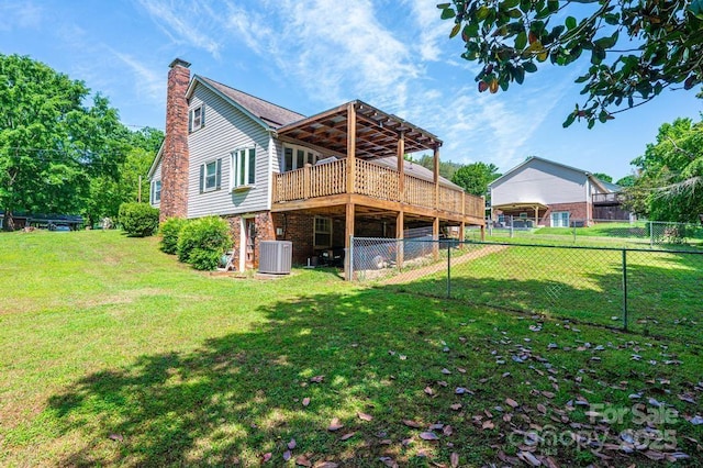 back of property featuring central AC, a chimney, and a deck