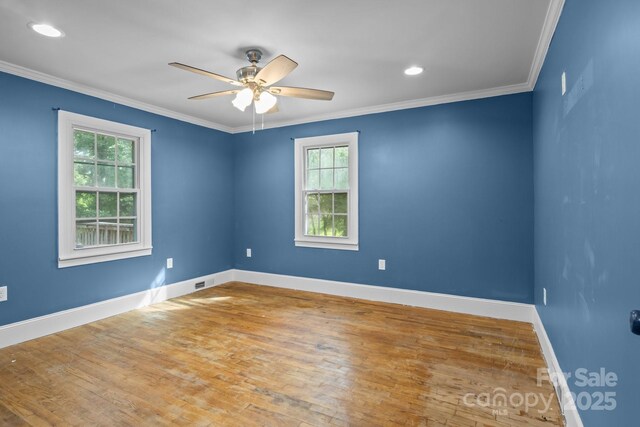800 Woodlawn St, Belmont, NC 28012 - spare room featuring crown molding, wood finished floors, a ceiling fan, and recessed lighting