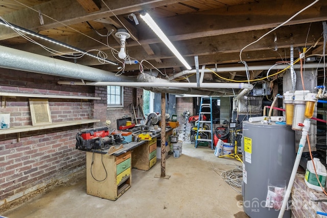 800 Woodlawn St, Belmont, NC 28012 - below grade area featuring water heater and brick wall