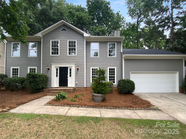 10518 Fairway Ridge Rd, Charlotte, NC 28277 - colonial home featuring a garage, driveway, and a chimney