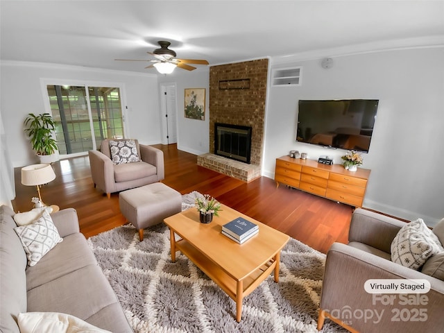 10518 Fairway Ridge Rd, Charlotte, NC 28277 - living area with wood finished floors, ceiling fan, and a brick fireplace