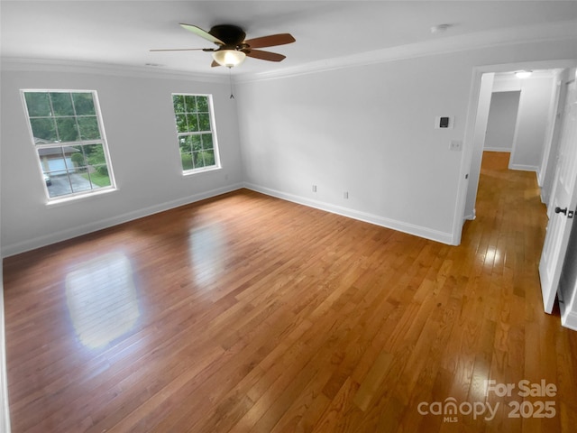 10518 Fairway Ridge Rd, Charlotte, NC 28277 - unfurnished room featuring a ceiling fan, ornamental molding, light wood-style flooring, and baseboards