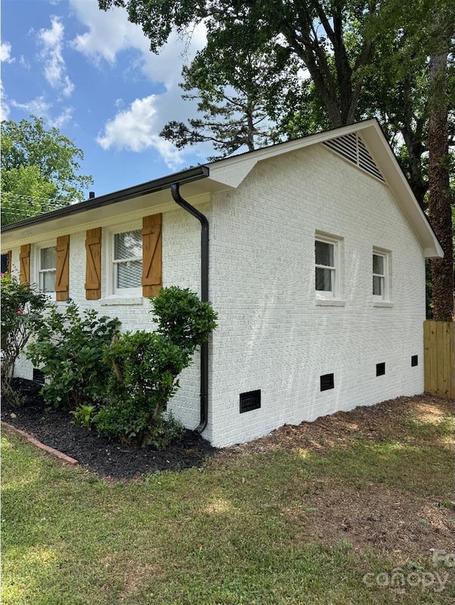 3700 Denson Pl, Charlotte, NC 28215 - view of home's exterior with crawl space and brick siding