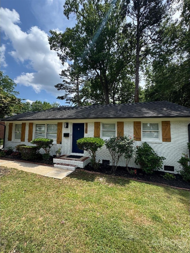 3700 Denson Pl, Charlotte, NC 28215 - ranch-style house with brick siding and a front lawn