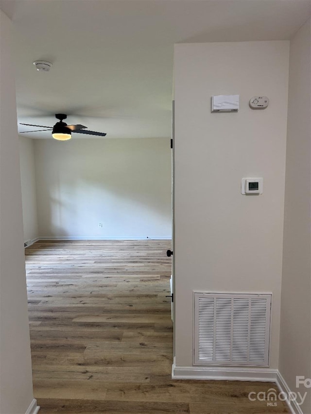 3700 Denson Pl, Charlotte, NC 28215 - hallway featuring wood finished floors and baseboards