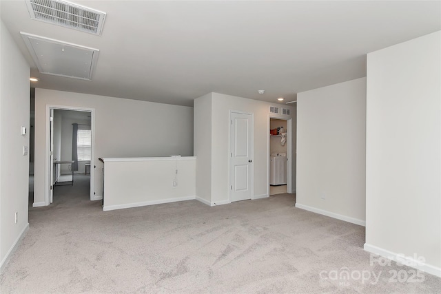 9505 Cotswood Pl, Gastonia, NC 28056 - carpeted spare room featuring attic access and washer and dryer
