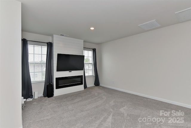 9505 Cotswood Pl, Gastonia, NC 28056 - unfurnished living room featuring light colored carpet and baseboards