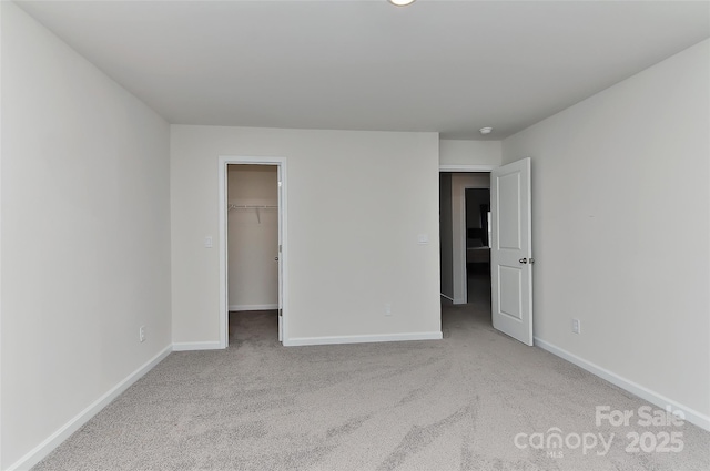 9505 Cotswood Pl, Gastonia, NC 28056 - unfurnished bedroom featuring carpet flooring and a spacious closet