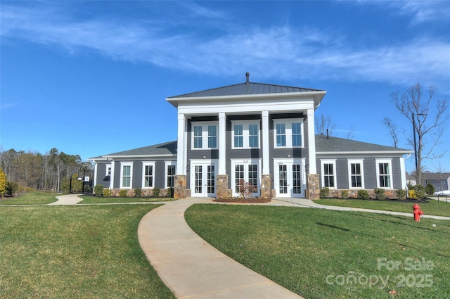 9505 Cotswood Pl, Gastonia, NC 28056 - view of front facade with french doors, a front yard, and stone siding