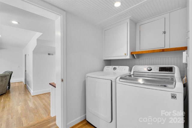 4024 Tyndale Ave, Charlotte, NC 28210 - washroom with independent washer and dryer, cabinet space, light wood-style flooring, baseboards, and recessed lighting