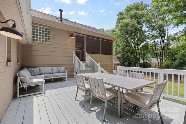 4024 Tyndale Ave, Charlotte, NC 28210 - deck featuring an outdoor hangout area, outdoor dining space, and a sunroom