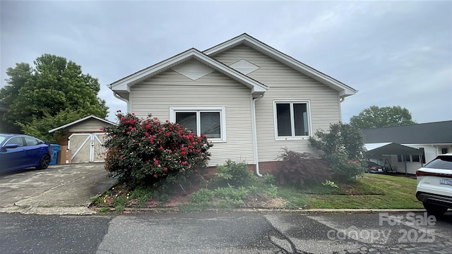 380 Woodlawn Ave, Cramerton, NC 28032 - view of front facade featuring an outdoor structure