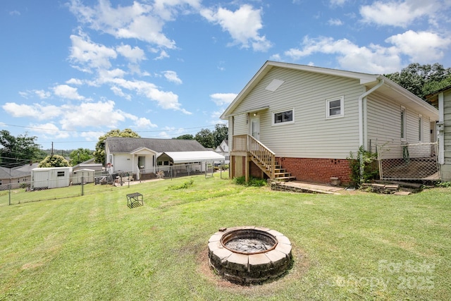 380 Woodlawn Ave, Cramerton, NC 28032 - back of house featuring a fire pit and stairs