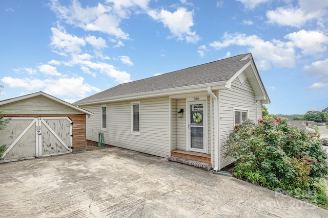 380 Woodlawn Ave, Cramerton, NC 28032 - view of front of home featuring a shed and roof with shingles