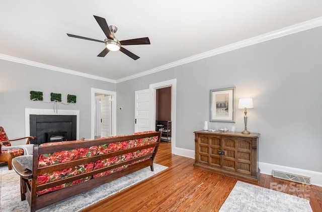 380 Woodlawn Ave, Cramerton, NC 28032 - bedroom with crown molding, wood finished floors, and a ceiling fan