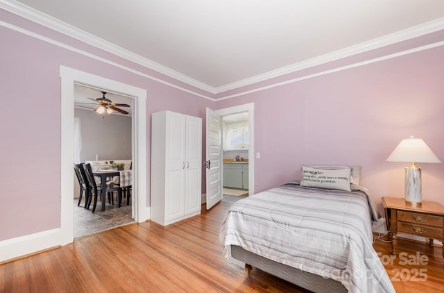 380 Woodlawn Ave, Cramerton, NC 28032 - bedroom featuring crown molding and light wood-style flooring