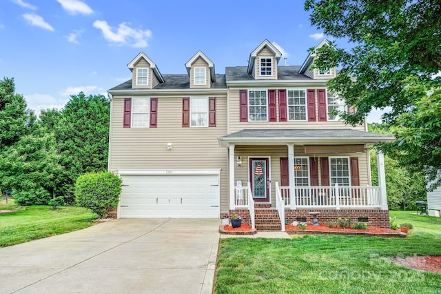 1503 Stoney Ct, York, SC 29745 - view of front facade featuring a porch, an attached garage, concrete driveway, and a front yard
