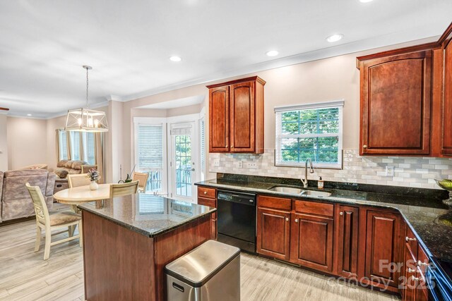 1503 Stoney Ct, York, SC 29745 - kitchen with dishwasher, a sink, light wood finished floors, a center island, and crown molding