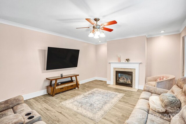 1503 Stoney Ct, York, SC 29745 - living area with a ceiling fan, baseboards, ornamental molding, wood finished floors, and a fireplace
