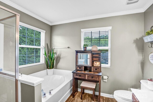 1503 Stoney Ct, York, SC 29745 - bathroom featuring vanity, healthy amount of natural light, a bath, wood finished floors, and ornamental molding