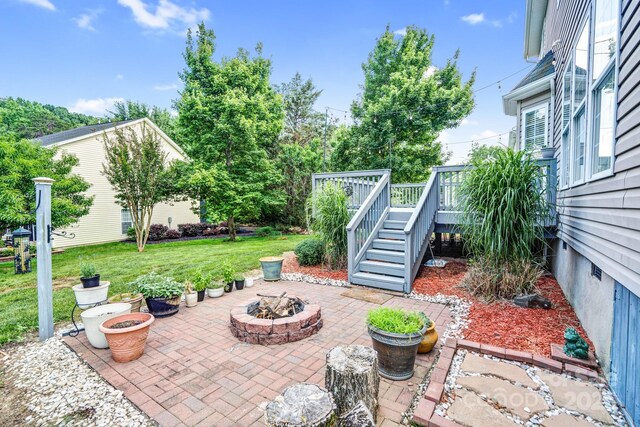 1503 Stoney Ct, York, SC 29745 - view of patio / terrace with a fire pit, stairway, and a wooden deck