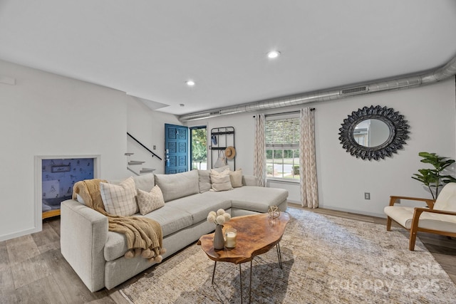 3528 Colony Rd Unit A, Charlotte, NC 28211 - living room with wood finished floors, stairs, recessed lighting, and baseboards