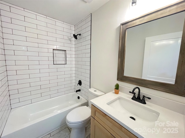 bathroom featuring toilet, washtub / shower combination, and vanity
