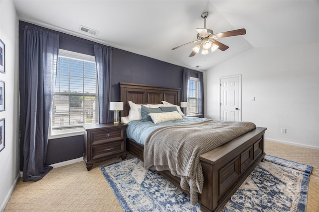 6107 Raisin Tree Ln, Charlotte, NC 28215 - bedroom with light carpet, baseboards, vaulted ceiling, and a ceiling fan