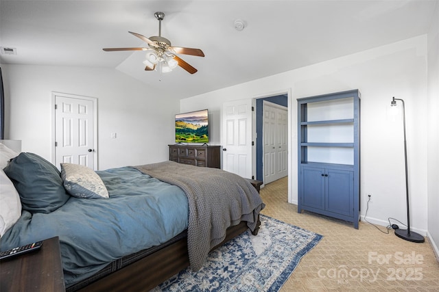 6107 Raisin Tree Ln, Charlotte, NC 28215 - bedroom with light carpet, lofted ceiling, baseboards, and ceiling fan