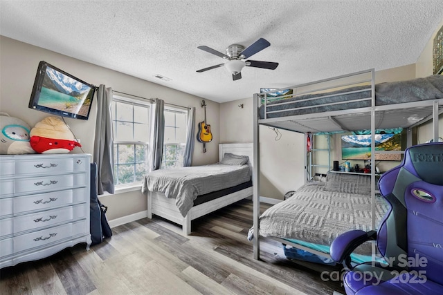 641 Saratoga Dr, Clover, SC 29710 - bedroom featuring baseboards, wood finished floors, a textured ceiling, and a ceiling fan
