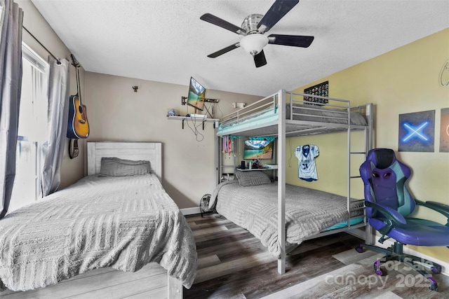641 Saratoga Dr, Clover, SC 29710 - bedroom featuring wood finished floors, a textured ceiling, a ceiling fan, and baseboards