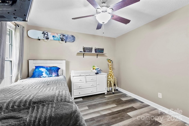 641 Saratoga Dr, Clover, SC 29710 - bedroom featuring dark wood-style flooring, baseboards, and a ceiling fan