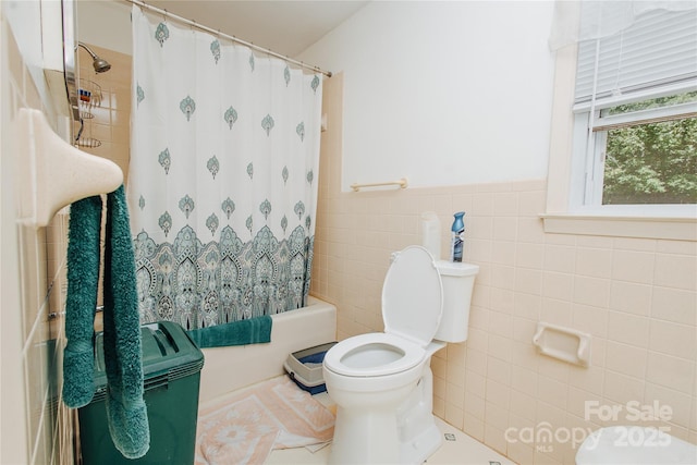 773 Peppers Creek Rd, Marion, NC 28752 - bathroom featuring toilet, tile walls, shower / tub combo, wainscoting, and tile patterned flooring