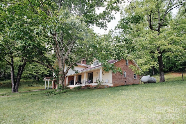 773 Peppers Creek Rd, Marion, NC 28752 - view of front of house with covered porch and a front lawn