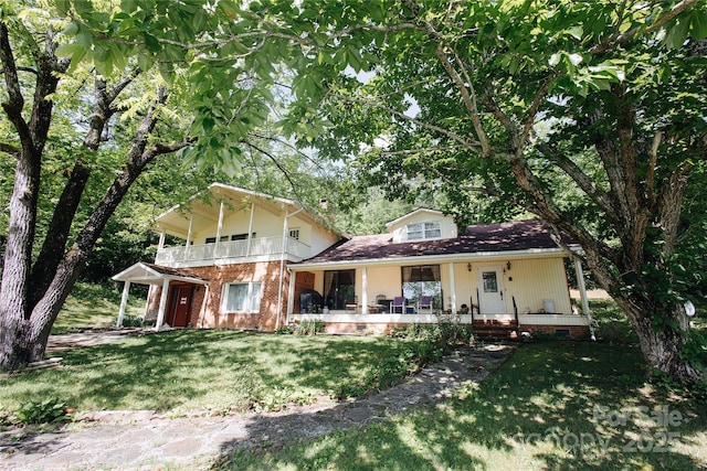 773 Peppers Creek Rd, Marion, NC 28752 - view of front of house featuring a front lawn, covered porch, and a balcony