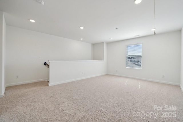 2588 Blue Sky Meadows Dr, Monroe, NC 28110 - unfurnished room featuring baseboards, light colored carpet, recessed lighting, and a smoke detector