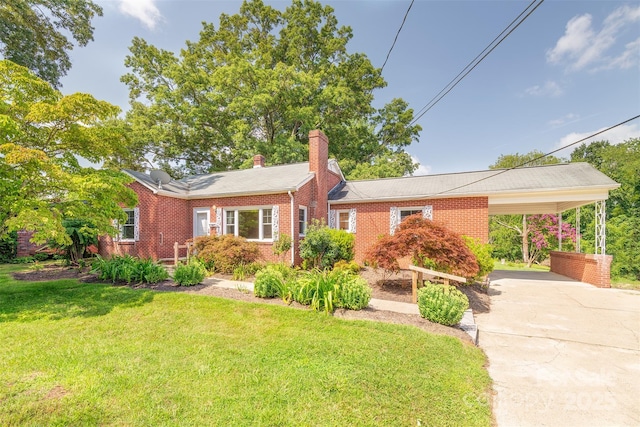 179 Brevard Rd, Asheville, NC 28806 - single story home with brick siding, a chimney, driveway, and a front lawn