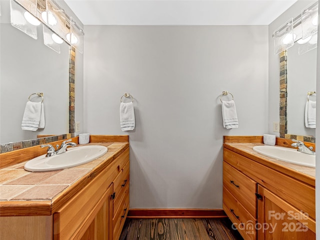 399 Toxaway Ct, Lake Toxaway, NC 28747 - bathroom with vanity, baseboards, and wood finished floors