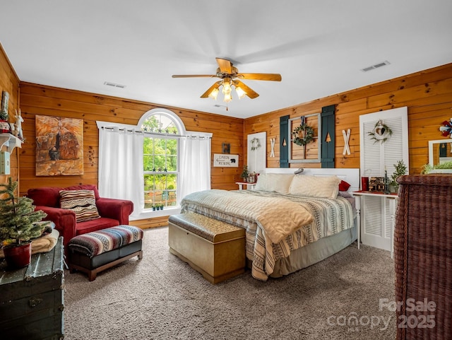 321 River Ridge Parkway, Rutherfordton, NC 28139 - carpeted bedroom with wooden walls and ceiling fan