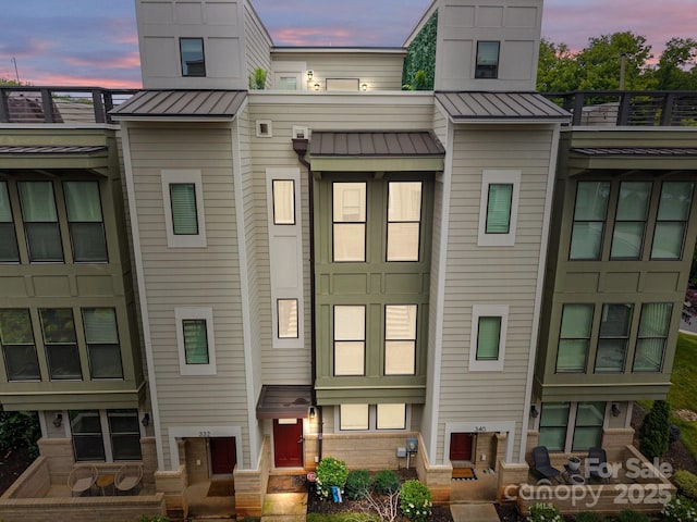 336 Uptown W Dr, Charlotte, NC 28208 - view of front of property featuring a standing seam roof