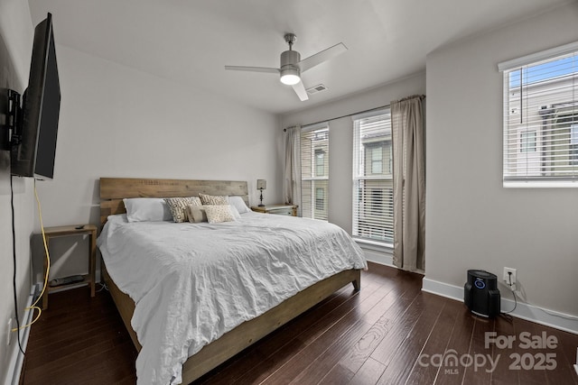 336 Uptown W Dr, Charlotte, NC 28208 - bedroom with wood finished floors, baseboards, and a ceiling fan