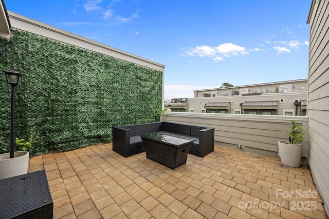 336 Uptown W Dr, Charlotte, NC 28208 - view of patio with an outdoor living space