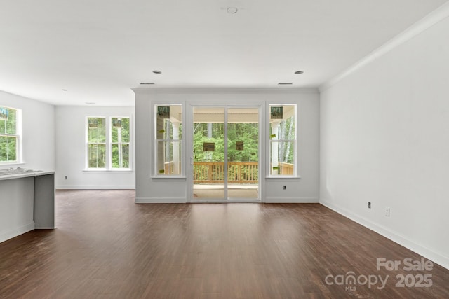 4315 Palm Dr, Denver, NC 28037 - unfurnished living room with baseboards, wood finished floors, and crown molding