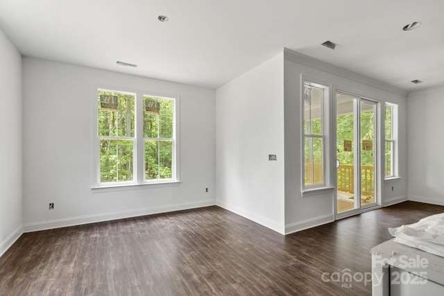 4315 Palm Dr, Denver, NC 28037 - unfurnished living room featuring baseboards and wood finished floors