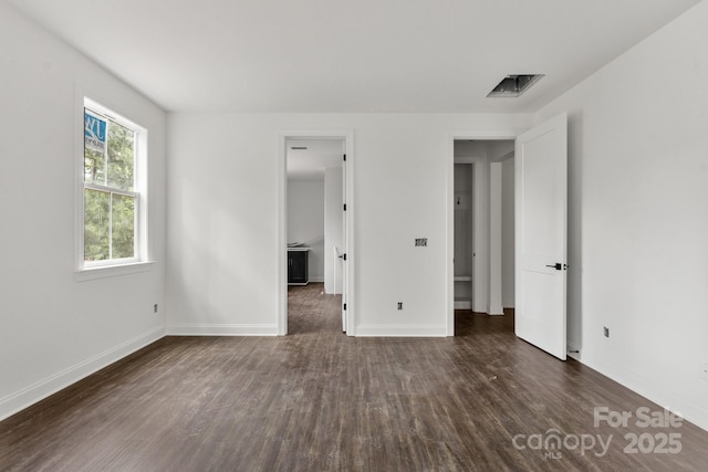 4315 Palm Dr, Denver, NC 28037 - unfurnished bedroom with dark wood-style flooring and baseboards